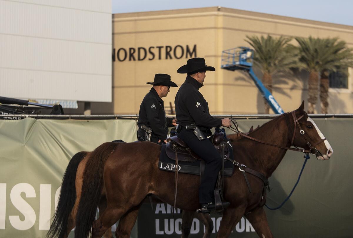 LAPD mounted unit officers patrol the Westfield Topanga shopping mall in 2021