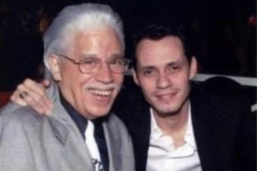 Marc Anthony y Johnny Pacheco.