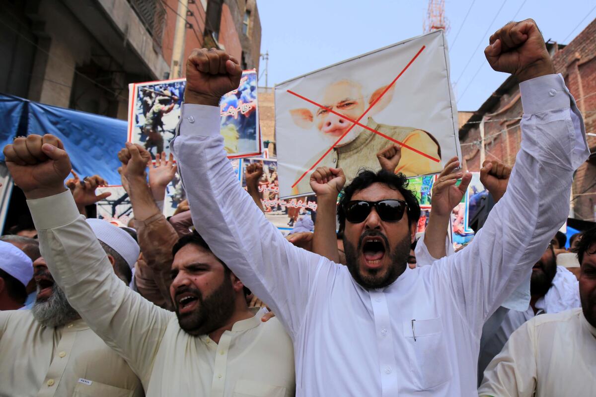 People in Peshawar, Pakistan, on Tuesday protest