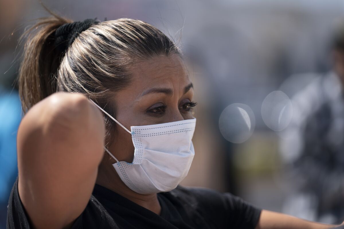 Gabriela Godinez, mother of Gustavo Gomez who was injured when violence erupted at Corregidora stadium,