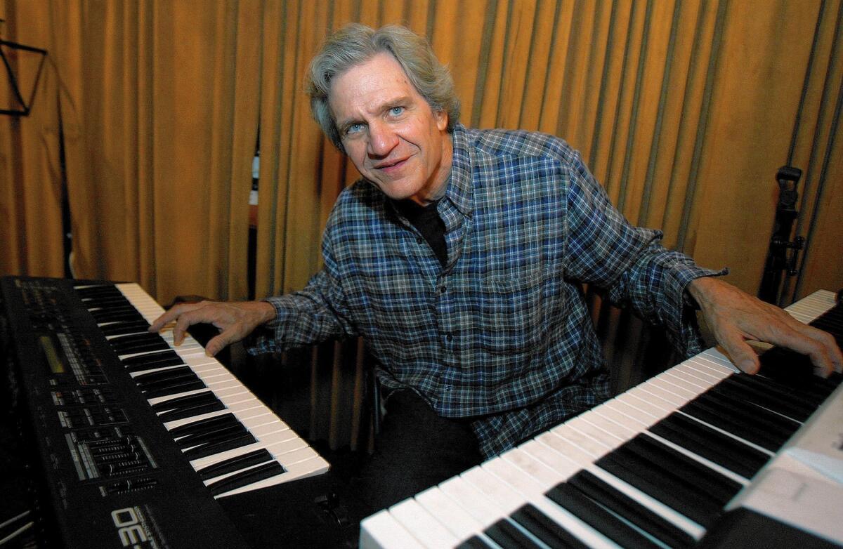Douglas Livingston, best known for his prowess on the pedal steel guitar, is a multifaceted musician and appears with the Michael Hastings Band at Viva Cantina in Burbank on Dec. 19.