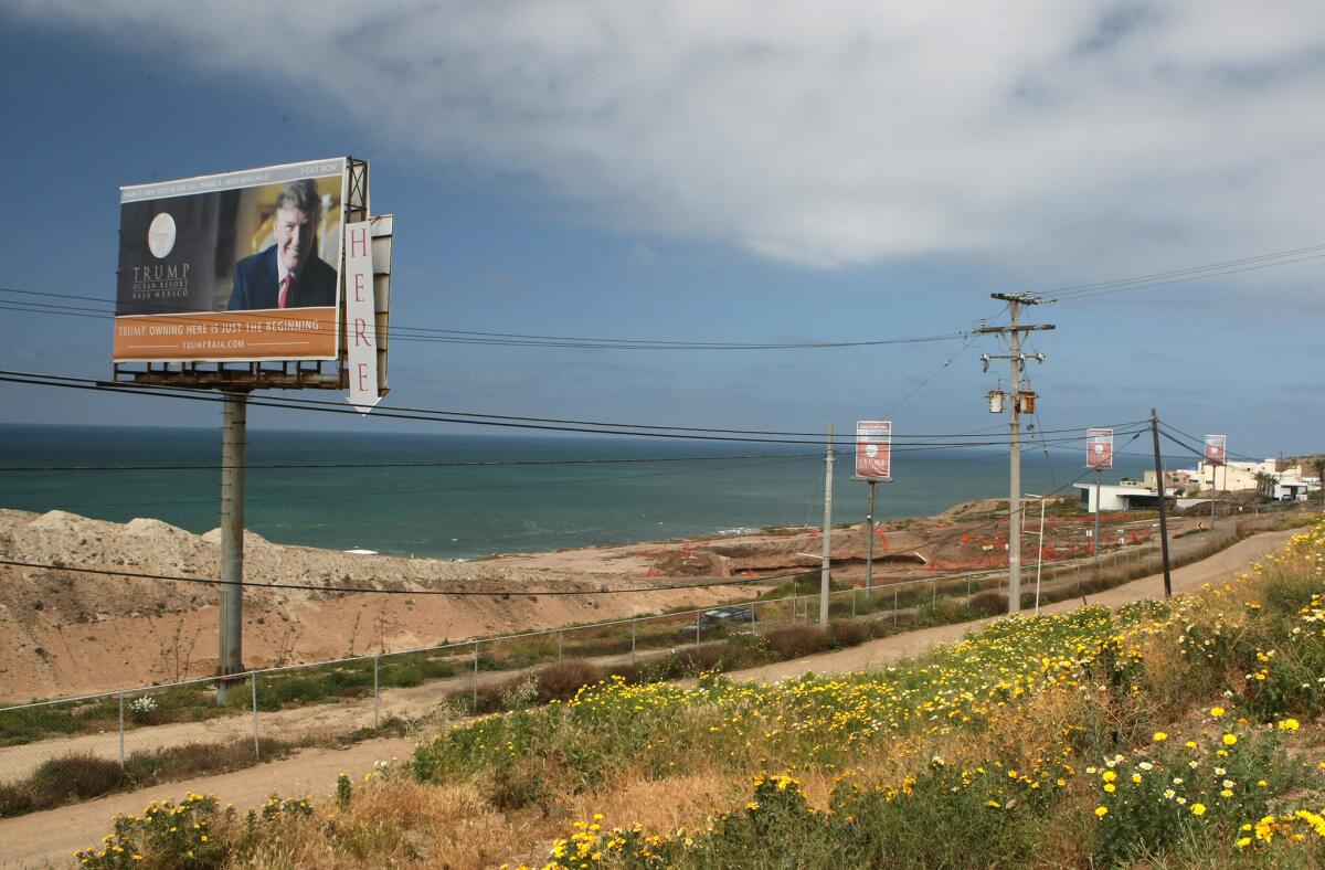 About 10 miles south of the border in April 2009, a billboard advertises Trump Ocean Resort Baja Mexico.