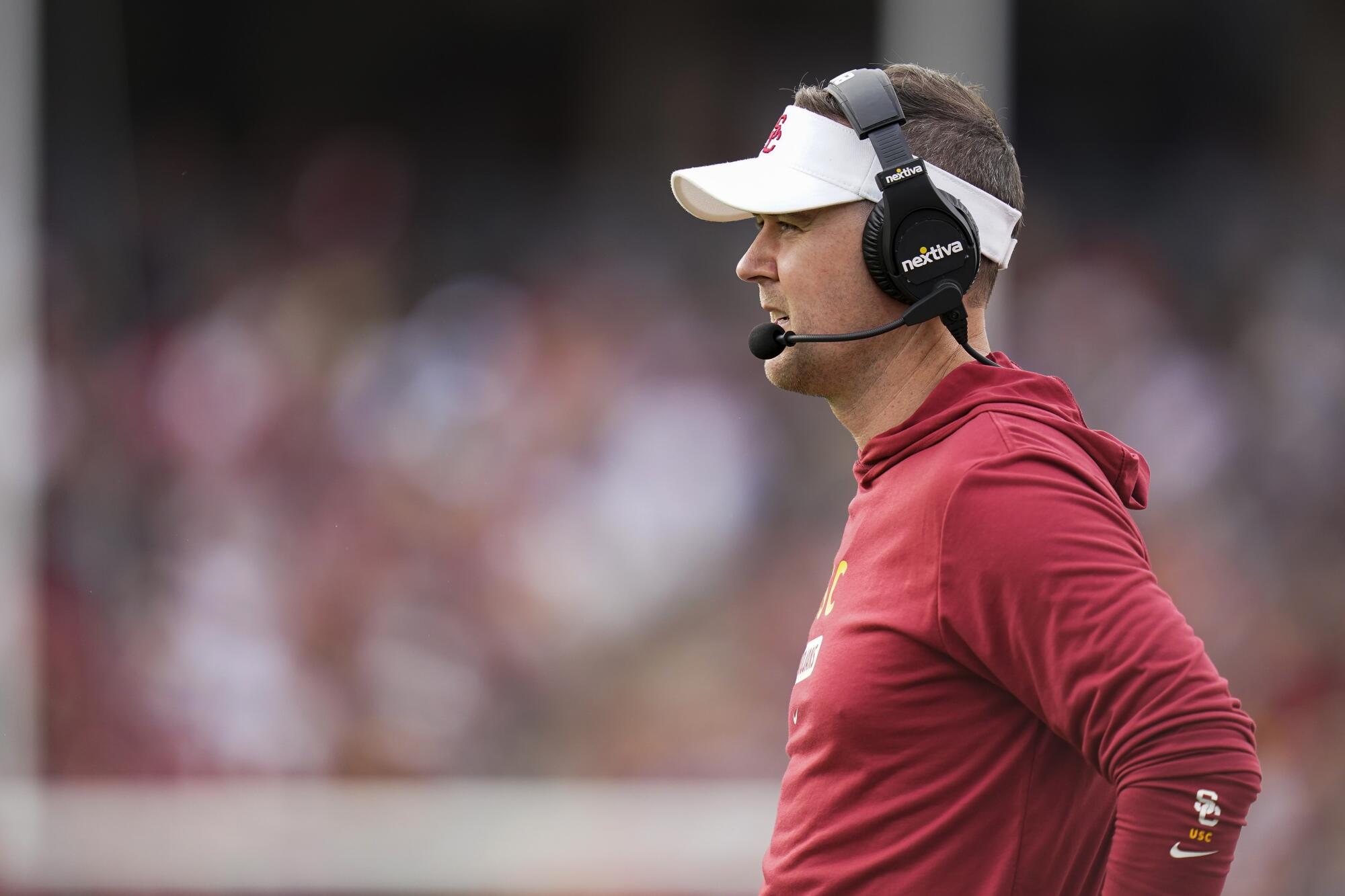 USC coach Lincoln Riley watches the Trojans from the sideline.