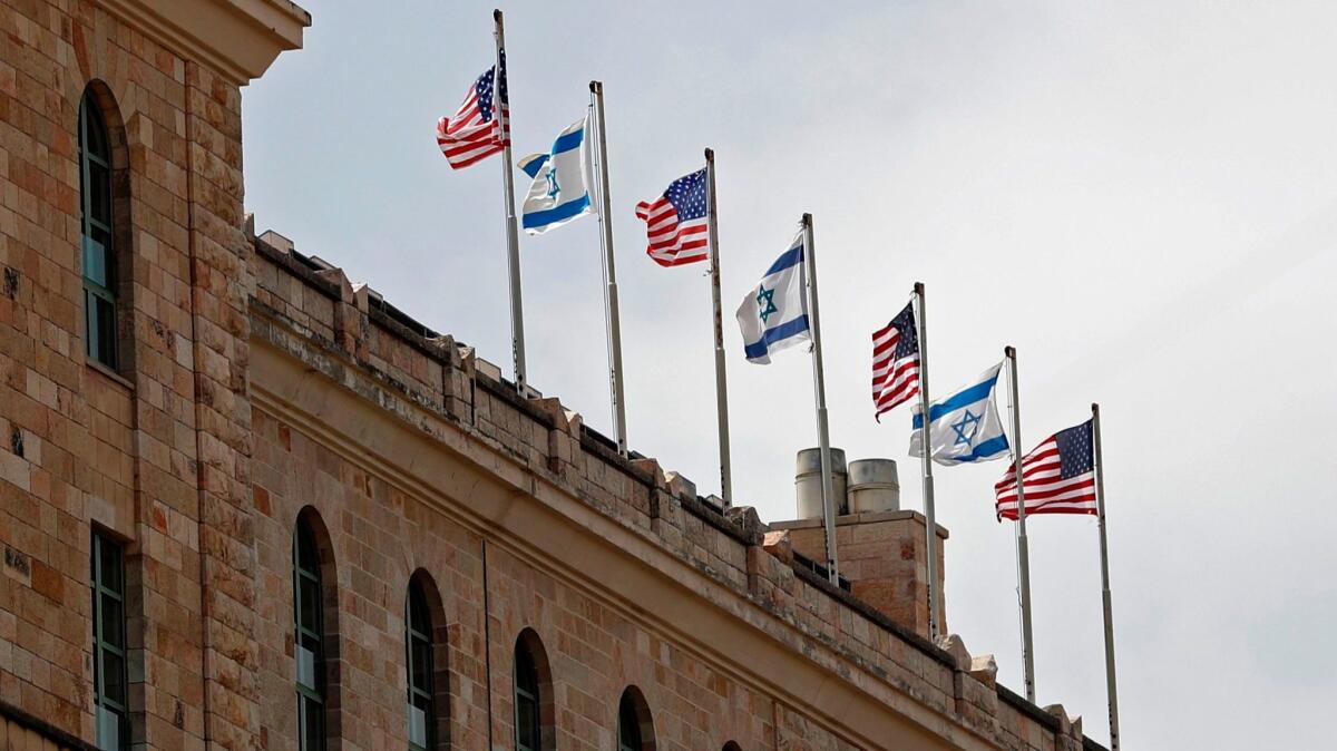 Israeli and U.S. flags fly from the King David Hotel on Friday, before President Trump's arrival. Trump is staying at the historic five-star hotel.