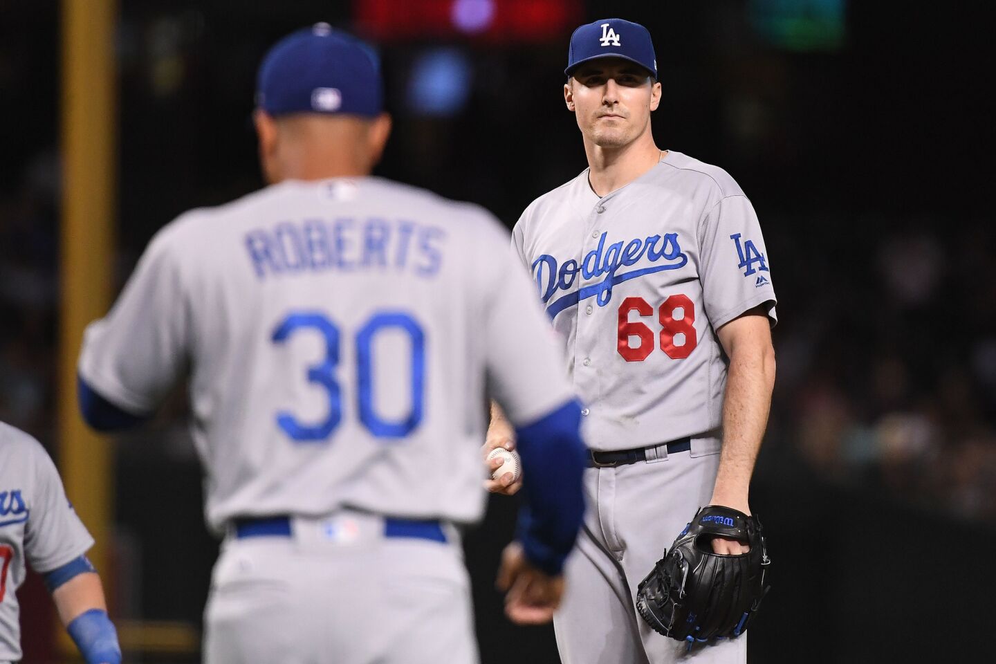 PHOENIX, AZ - SEPTEMBER 26: Ross Stripling #68 of the Los Angeles Dodgers reacts as manager Dave Roberts #30 approaches the mound to relieve him during the second inning of the MLB game against the Arizona Diamondbacks at Chase Field on September 26, 2018 in Phoenix, Arizona. (Photo by Jennifer Stewart/Getty Images) ** OUTS - ELSENT, FPG, CM - OUTS * NM, PH, VA if sourced by CT, LA or MoD **