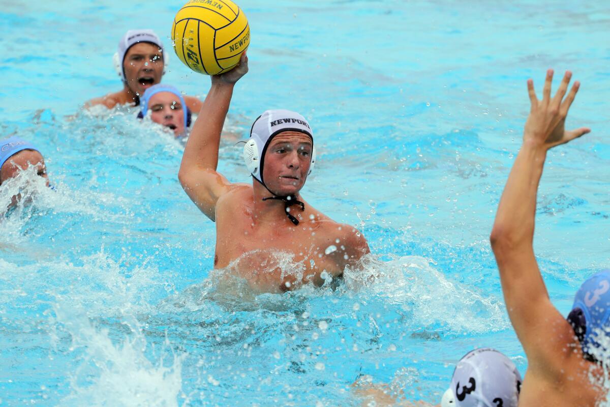 Newport Harbor's Quinn Bartlett (7) takes a shot against rival Corona del Mar on Saturday.