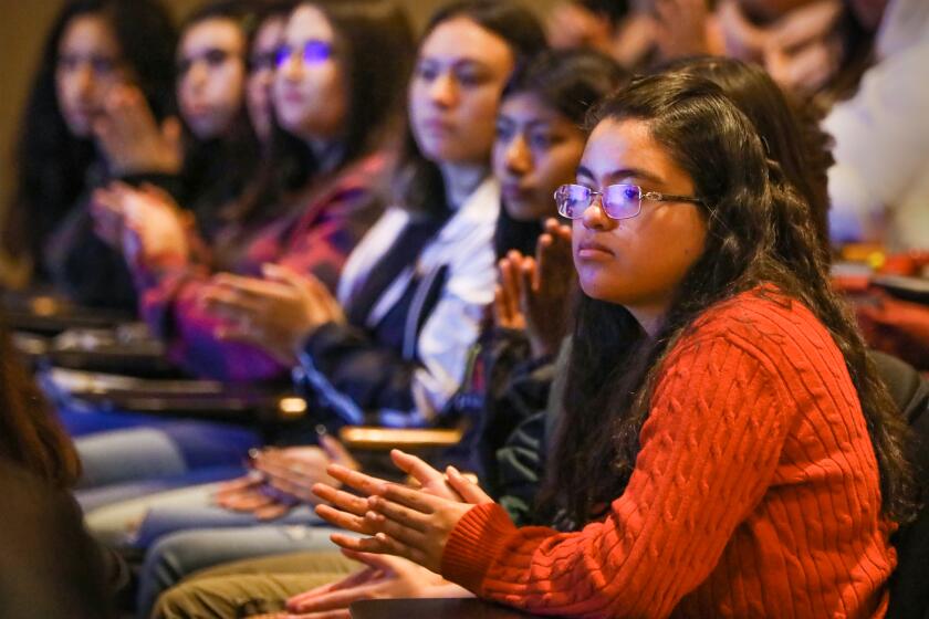 San Diego Unified School District high school students listen as Karen Nelson, Ph.D., President of the J. Craig Venter Institute delivers the keynote address during the 5th annual Women in Biotech event, ÒThe Places Your Imagination Takes You,Ó held at the Salk Institute, November 13, 2019, in La Jolla.