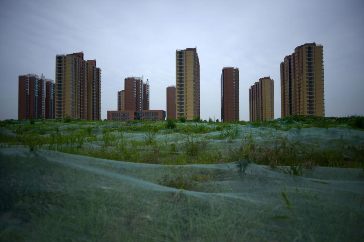 Residential buildings on the Beijing skyline on June 23, 2016. Parts of Beijing are sinking more than four inches a year, a study shows.