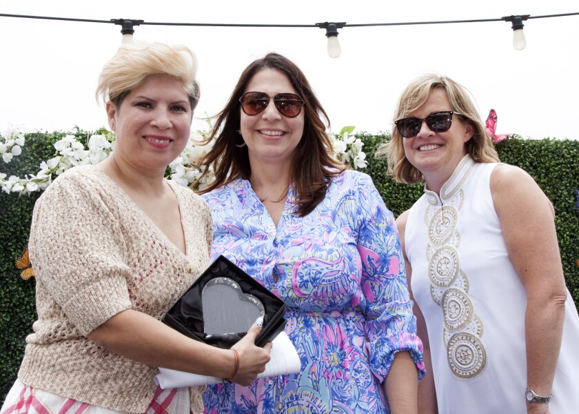Yvonne Polanco, Batty Bucklen and Staci Fournier at recent luncheon held at Balboa Bay Resort.