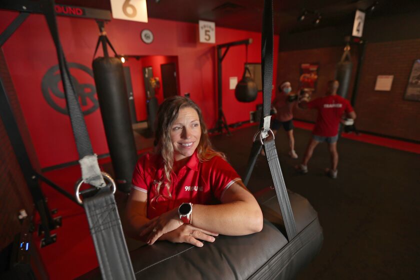 LONG BEACH, CA - JUNE 30:. Ashley Richardson, franchise owner of 9Round Fitness gym in Long Beach, said that it's hard for her business to find personal trainers to hire in the coronavirus postpandemic reopening. (Luis Sinco / Los Angeles Times)