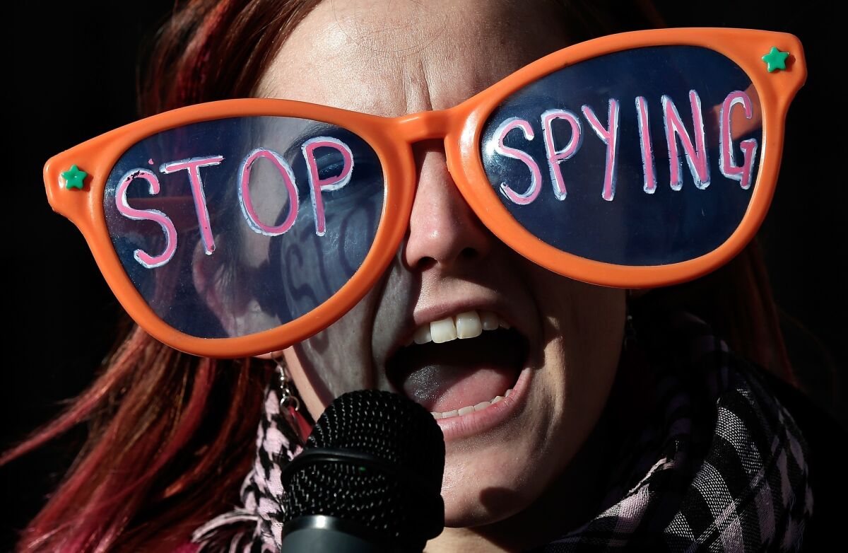 A protester demonstrating against the surveillance of U.S. citizens by the NSA outside the Justice Department in Washington last week.