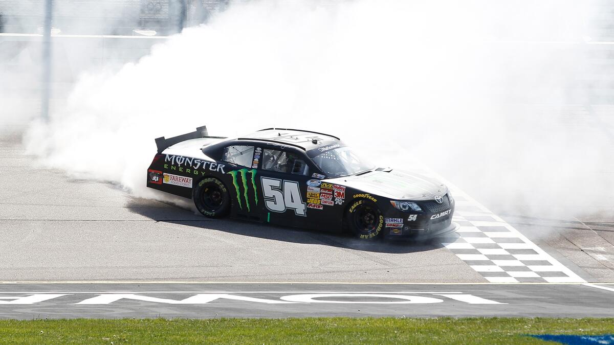 Sam Hornish Jr. celebrates after winning Sunday's NASCAR Nationwide Series race at Iowa Speedway.