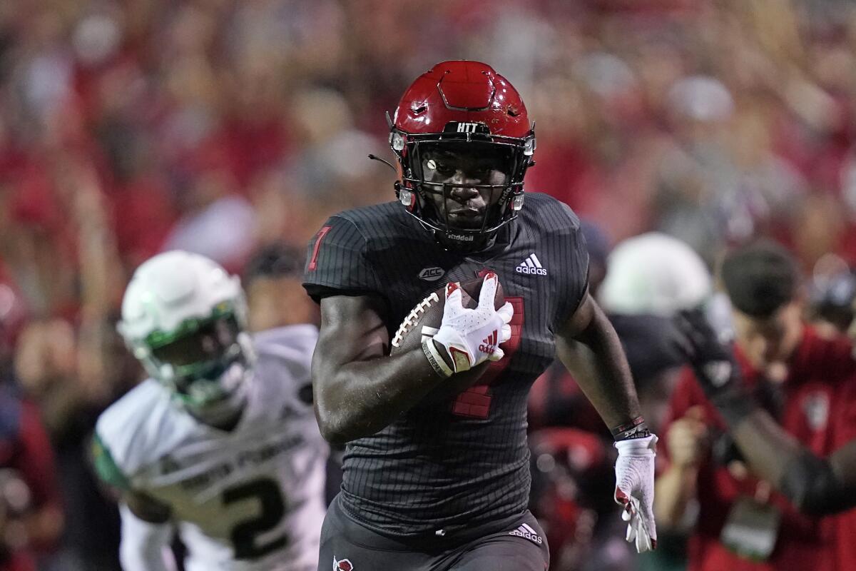 North Carolina State running back Zonovan Knight runs for a touchdown against South Florida.