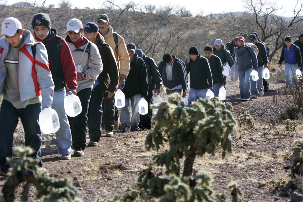 Immigrants in Sasabe, Ariz., in 2007. The number of people in the U.S. illegally who perished trying to cross the southern Arizona desert in 2014 was the lowest since 2001.