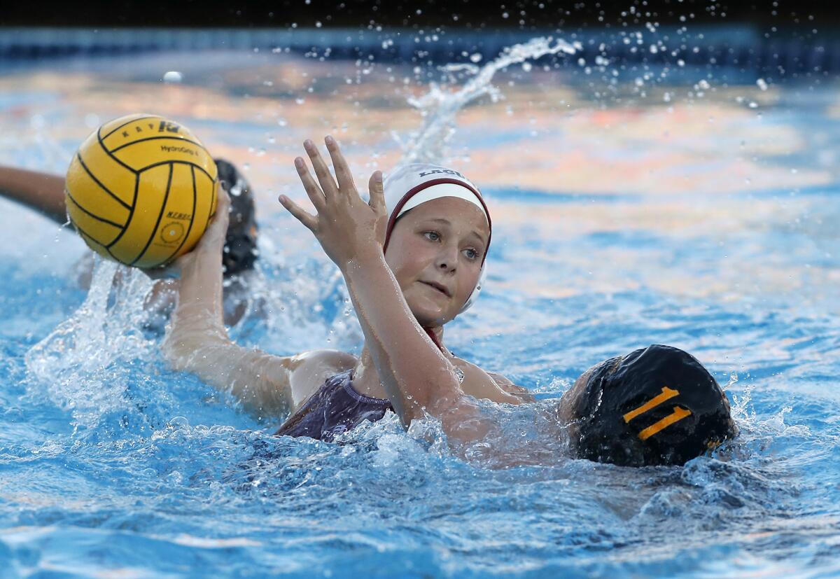 Laguna Beach's Morgan Van Alphen, pictured holding the ball in a Feb. 1 match against Foothill, helped the Breakers get past Los Alamitos 12-7 in the first round of the CIF Southern Section Division 1 playoffs on Thursday.