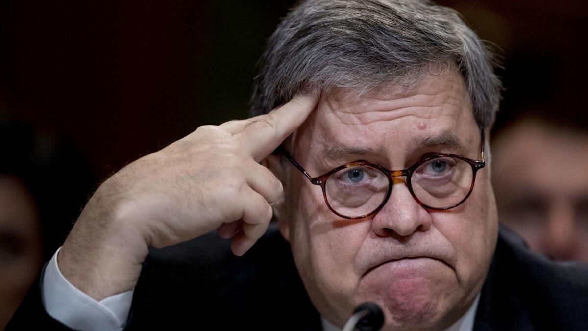 U.S. Attorney General William Barr reacts as he appears before a Senate Appropriations subcommittee on April 10.