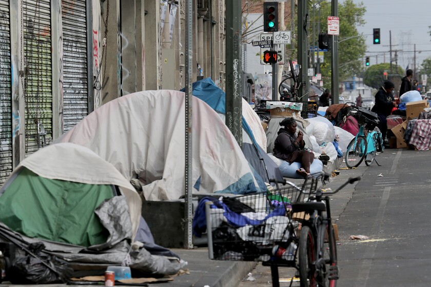 LOS ANGELES, CA - APRIL 21:. Entire blocks are packed with homeless encampments on skid row in downtown Los Angeles. (Luis Sinco / Los Angeles Times) LA homeless