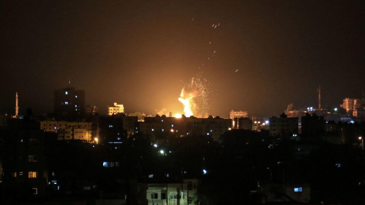 An explosion is seen in northern Gaza City after an airstrike by Israeli forces on Wednesday.