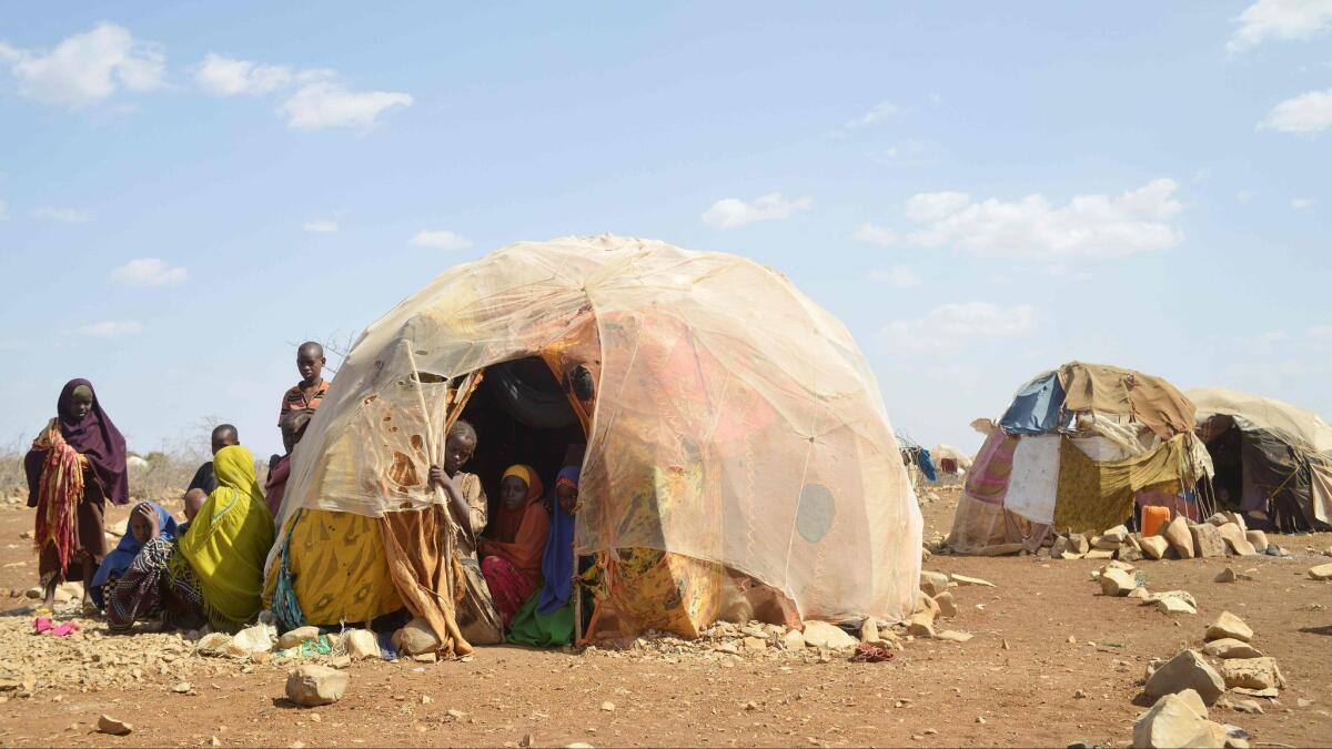 This photo taken on March 14, 2017, shows internally displaced Somalis at a makeshift camp on the outskirts of Baidoa in Somalia.