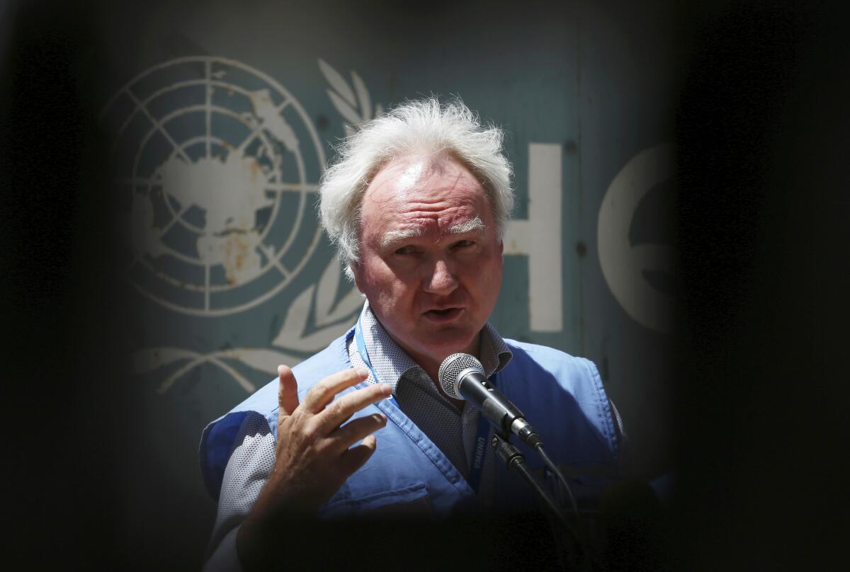 Matthias Schmale, UNRWA's director in Gaza, speaks during a news conference in front of the UNRWA headquarters in Gaza City, Wednesday, May 19, 2021. (AP Photo/Adel Hana)