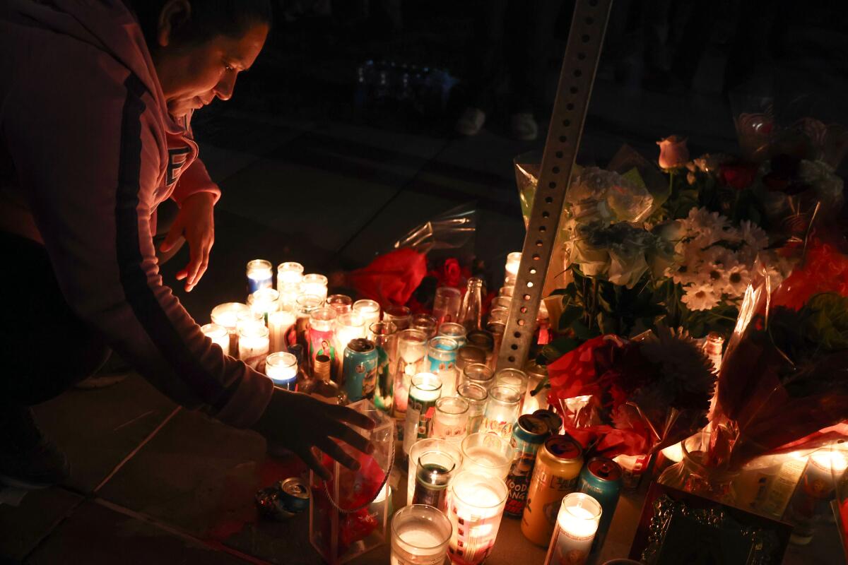 Giselle Parada attends a vigil during a memorial for Kevin Parada on Feb. 13 in Bell.