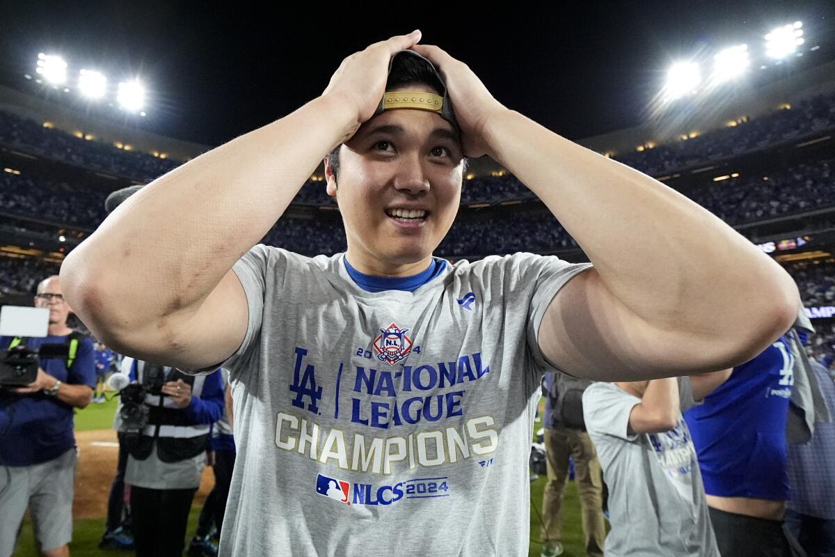 Los Angeles Dodgers' Shohei Ohtani celebrates  