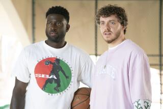 Sinqua Walls, left, and Jack Harlow in the movie "White Men Can't Jump."