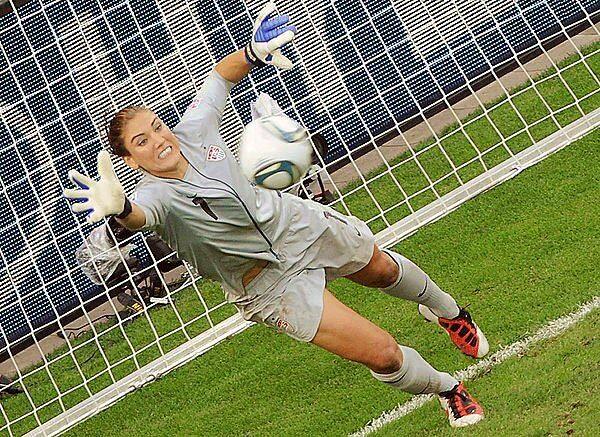 Hope Solo makes a save on a penalty kick by Brazil's Daiane to provide the winning margin for the U.S. in a Women's World Cup quarterfinal.
