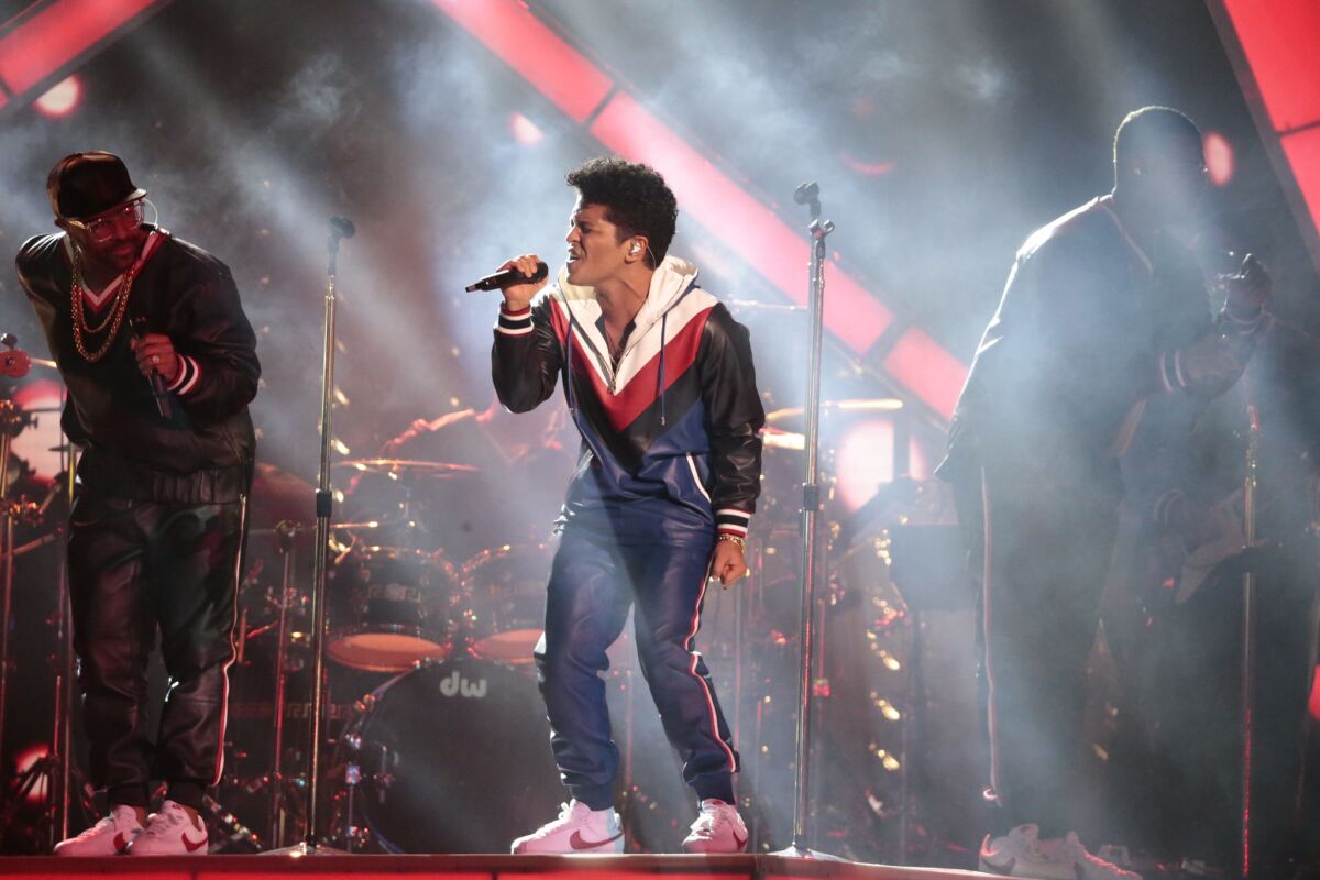 Bruno Mars performs at the 59th Grammy Awards.