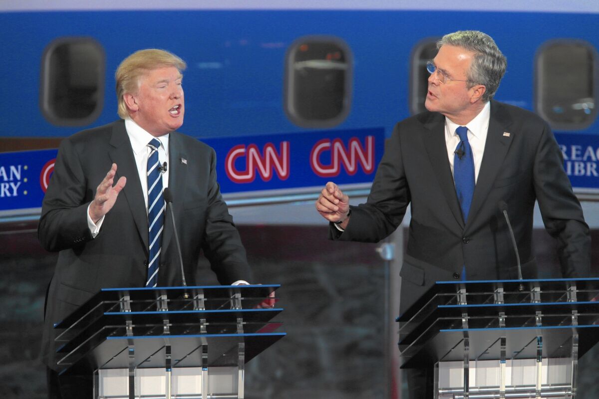 Republican presidential candidates Donald Trump and Jeb Bush spar in the GOP debate at the Reagan Presidential Library in September.