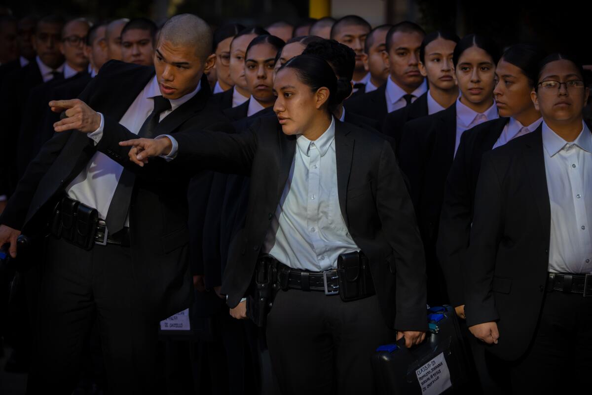 Graduating class of police officers and new recruits at LAPD Police Academy on Thursday, Dec. 7, 2023 in Los Angeles.