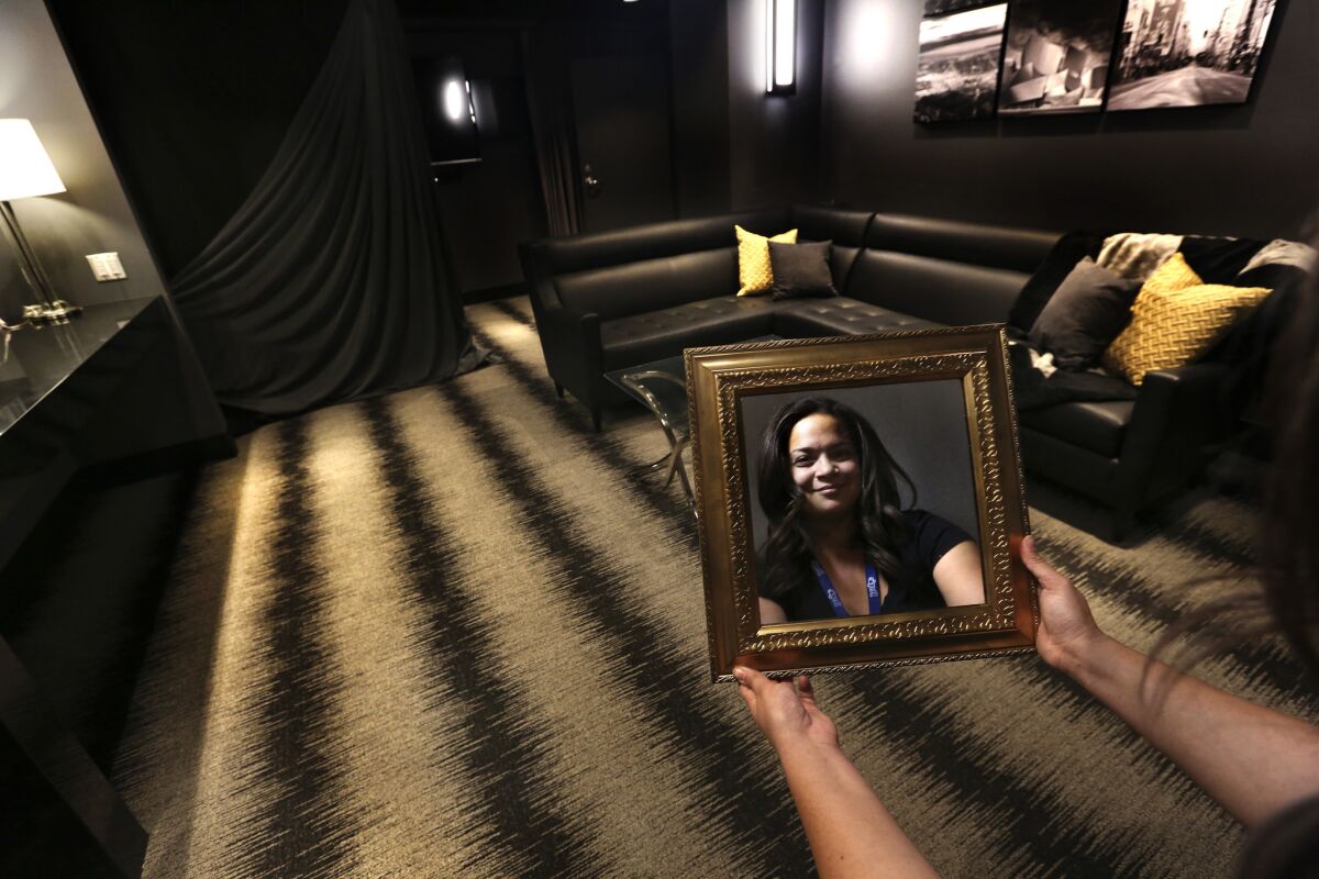 Jasmine McAtee, dressing room coordinator for the Grammy Awards, is shown inside one of 80 dressing rooms to be used by performers, dancers, band members and the show's host.