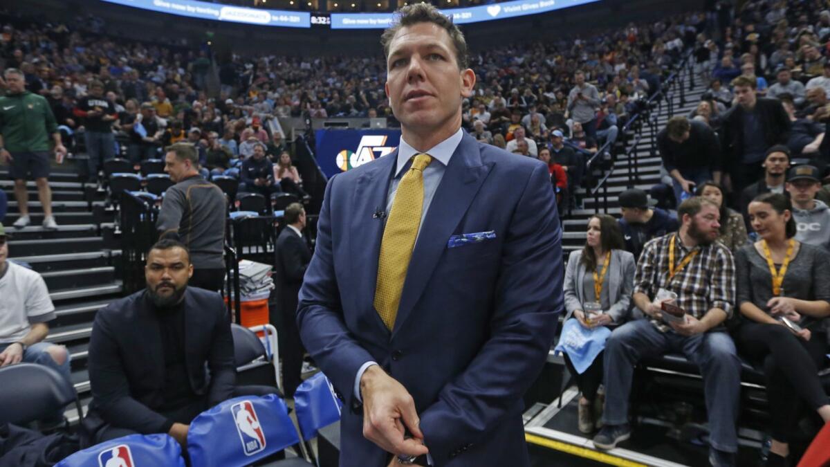 Luke Walton prepares for a Lakers game in Utah earlier this season.