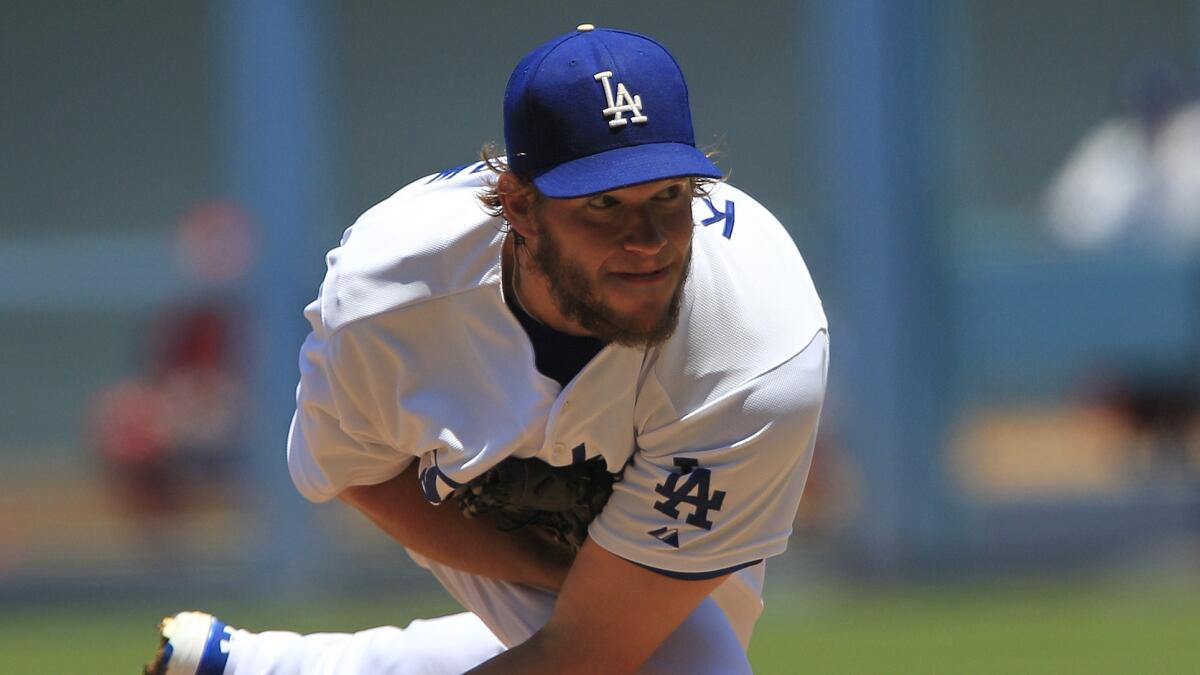 Dodgers starter Clayton Kershaw delivers a pitch during the team's 6-0 win over the St. Louis Cardinals on Sunday at Dodger Stadium.