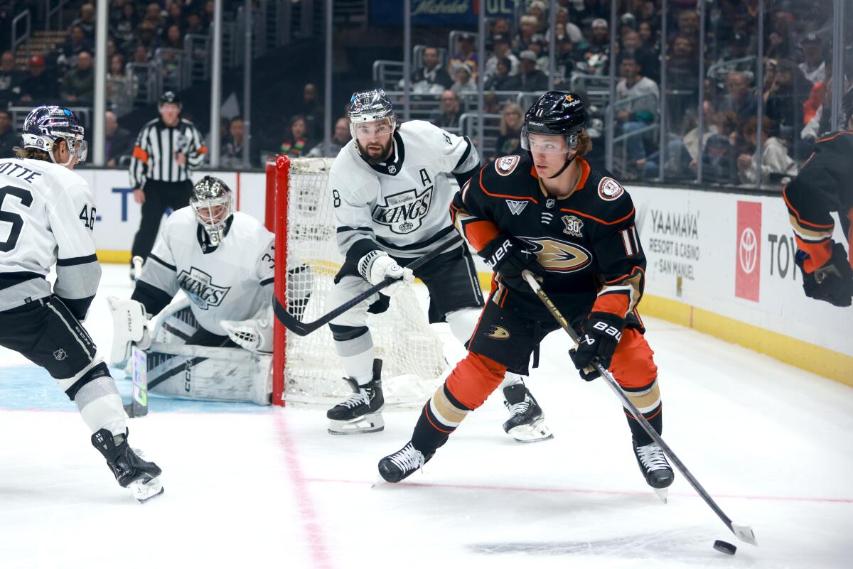 Ducks forward Trevor Zegras controls the puck during a 3-1 loss to the Kings on Saturday at Crypto.com Arena.