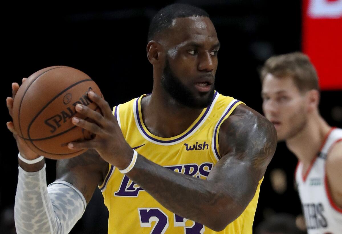 Lakers forward LeBron James looks for an open teammate.