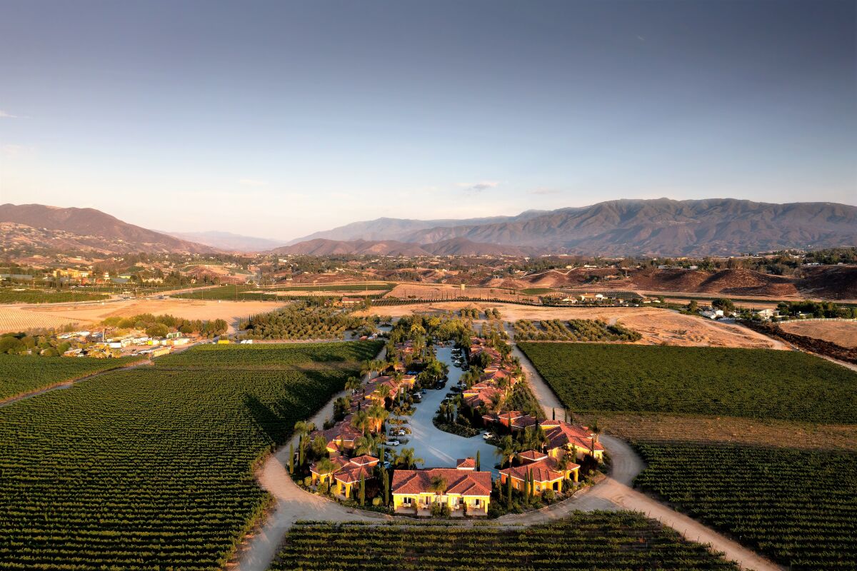 An aerial view of a winery and resort.