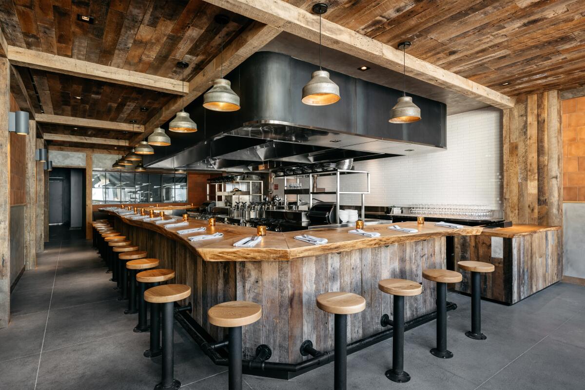 An interior photo of the counter seating within Uovo Studio City.