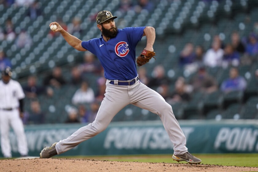 Chicago Cubs pitcher Jake Arrieta throws against the Detroit Tigers in the fourth inning of a baseball game in Detroit, Friday, May 14, 2021. (AP Photo/Paul Sancya)