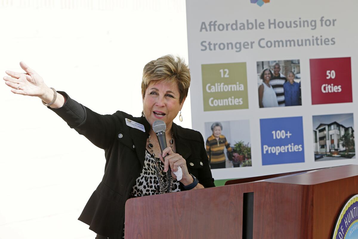 Mayor Barbara Delgleize speaks during a groundbreaking ceremony for Huntington Beach Seniors on Wednesday.