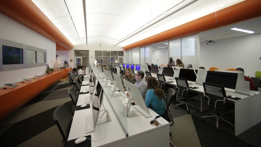 Patrons use computers at BiblioTech, a digital public library in San Antonio, Texas.