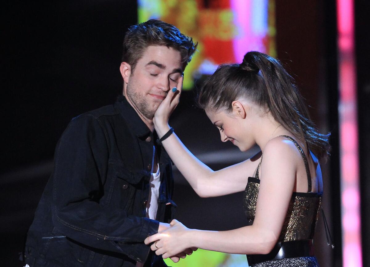Robert Pattinson and Kristen Stewart at the 2010 MTV Movie Awards.