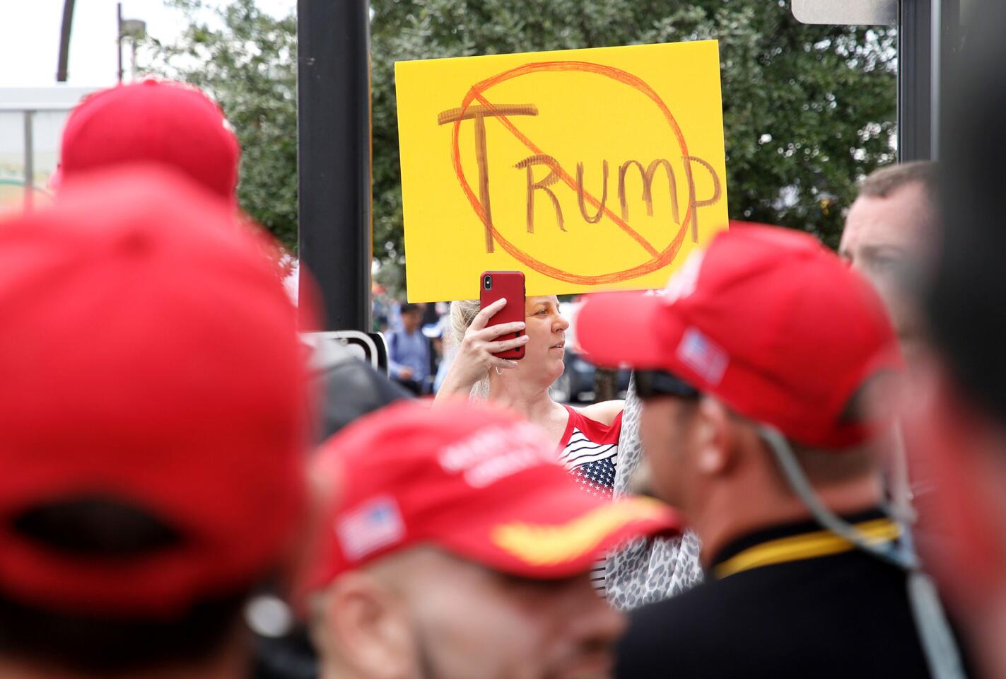 An anti-Trump protester outside the Orlando rally.
