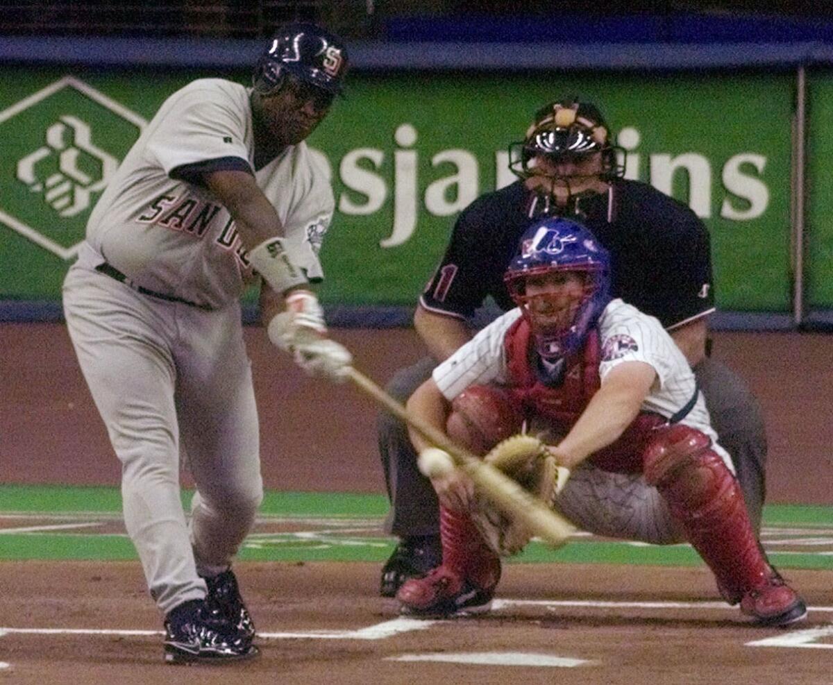 The Padres' Tony Gwynn gets his 3,000th career hit in the first inning against the Montreal Expos in 1999 in Montreal.