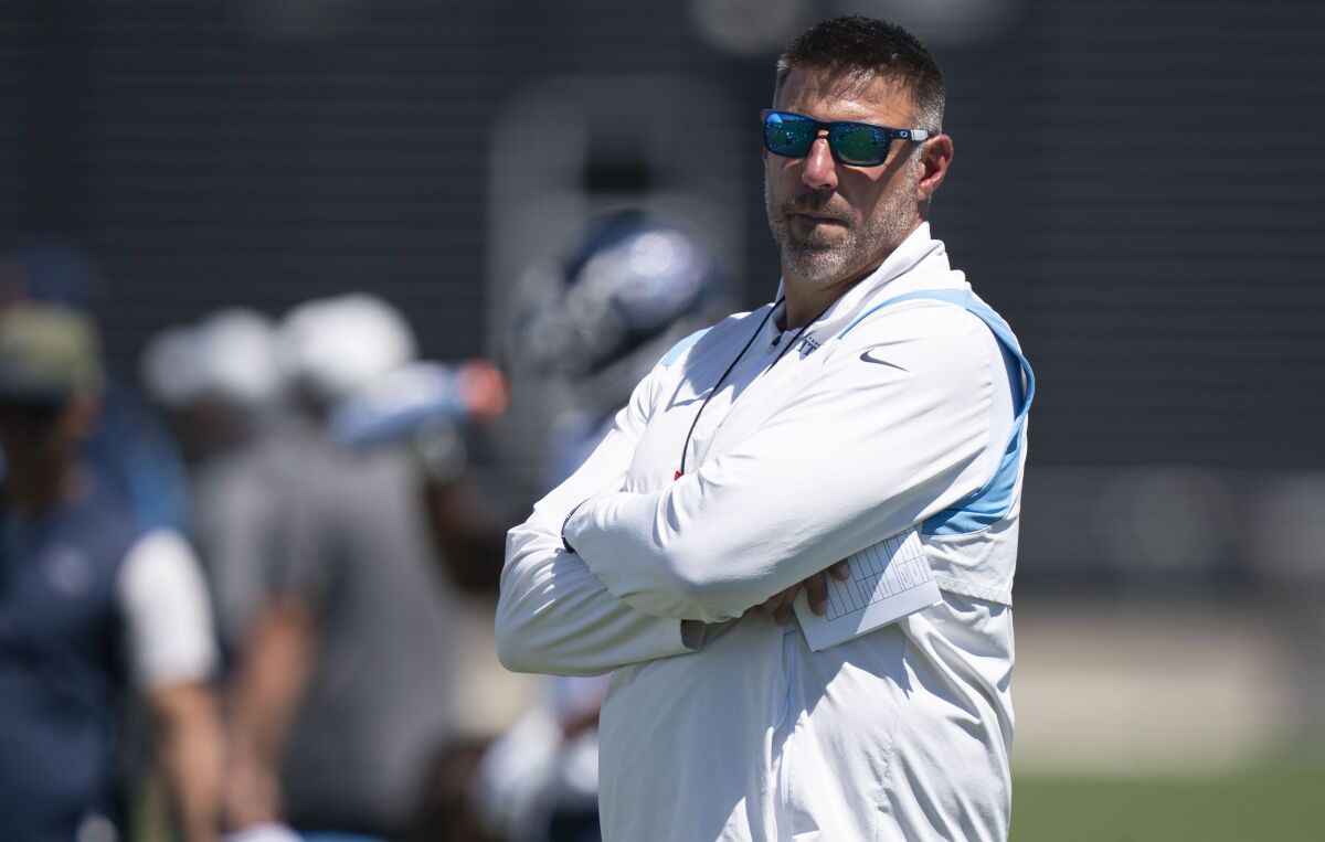 Tennessee Titans head coach Mike Vrabel watches his players during an NFL football training camp practice Saturday, Aug. 13, 2022, in Nashville, Tenn. (George Walker IV/The Tennessean via AP)