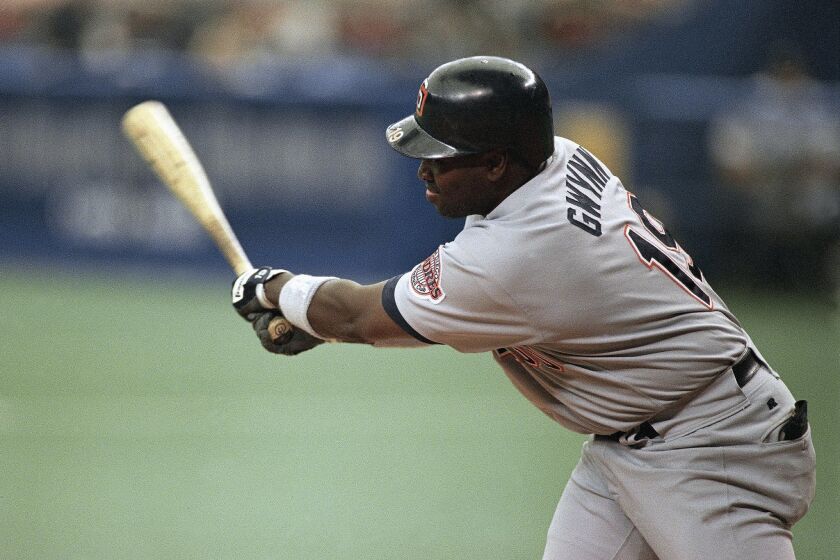 San Diego Padres’ Tony Gwynn swings at a pitch during the fourth inning against the Houston Astros, Thursday, August 11, 1994 in Houston. Gwynn raised his batting average to .394 during the game against the Astros. San Diego won 8-6. (AP Photo/David J. Phillip)