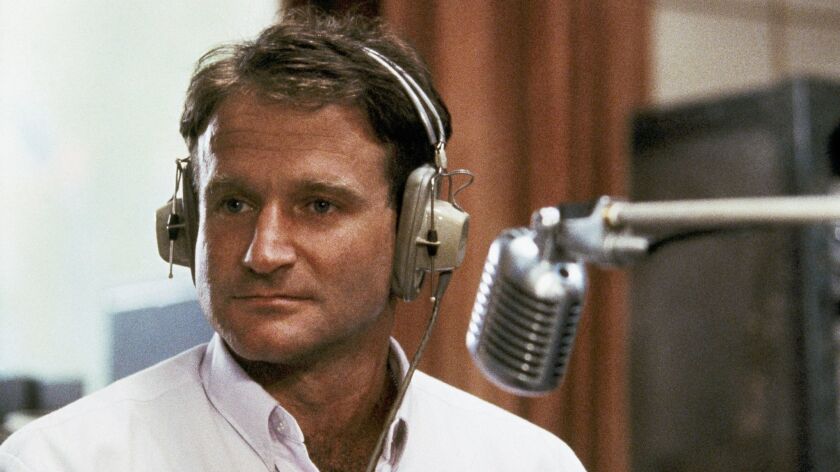Robin Williams, in character as disc-jockey Adrian Cronauer. "Good Morning, Vietnam" was a departure from other Vietnam war movies that focused on bloody realism.