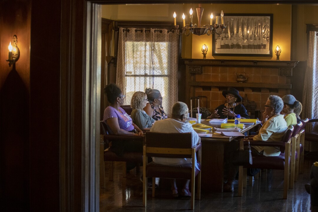 Women in the support group talk about their caregiving experiences