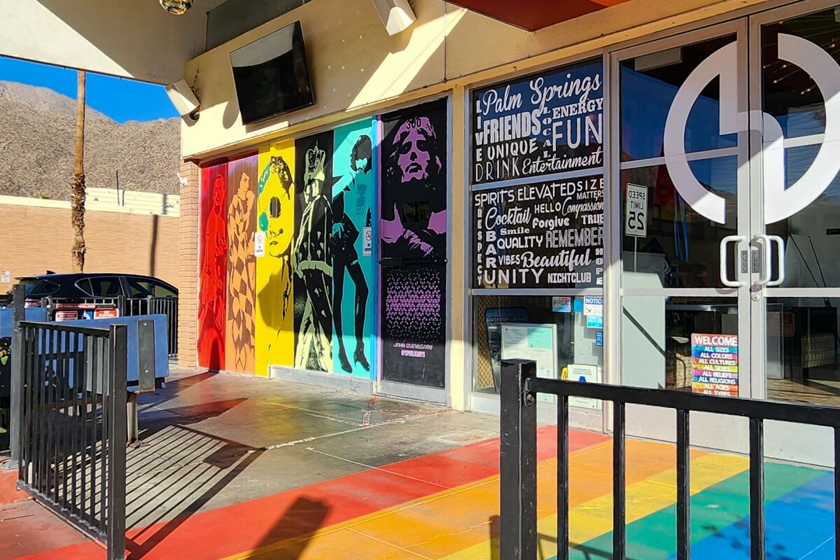 The exterior of a restaurant with rainbow decorations