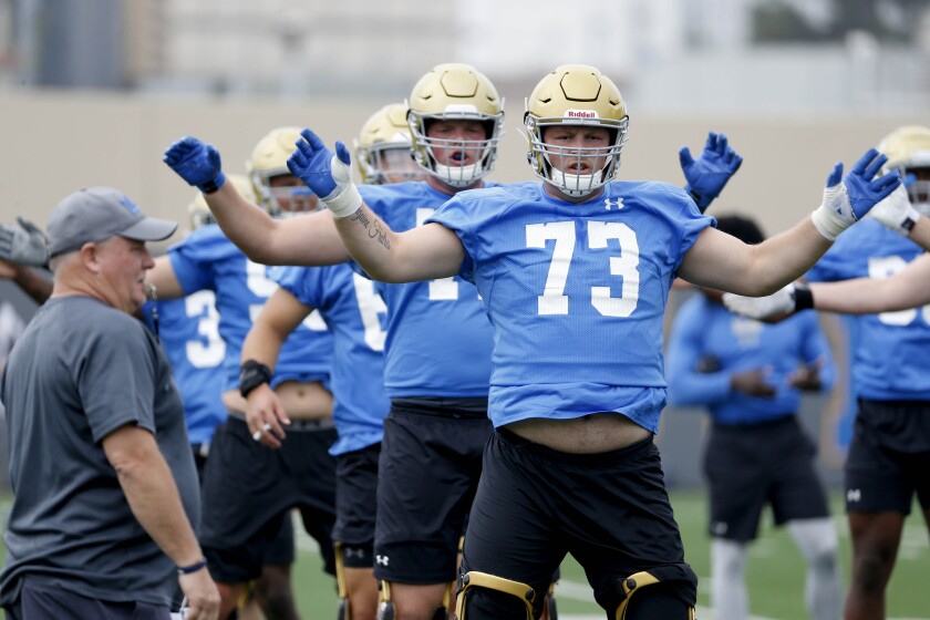  Jake Burton (73), offensive line, at fall football camp practice at the Wasserman Football Center on  July 31, 2019